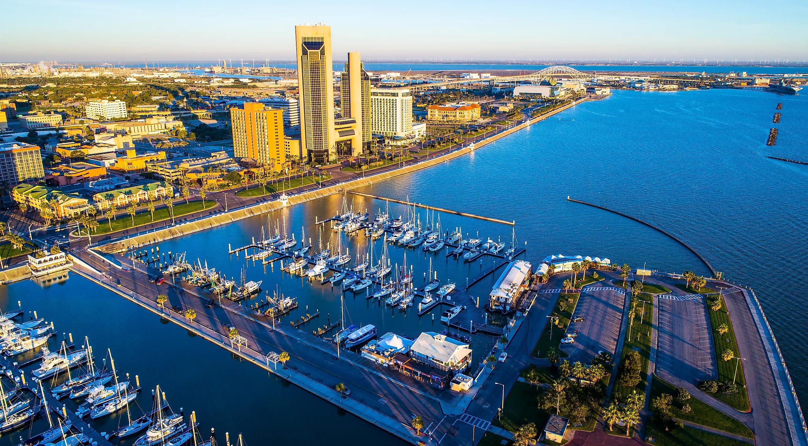 Aerial view of Corpus Christi bayfront, marina, and Harbor Bridge at golden hour